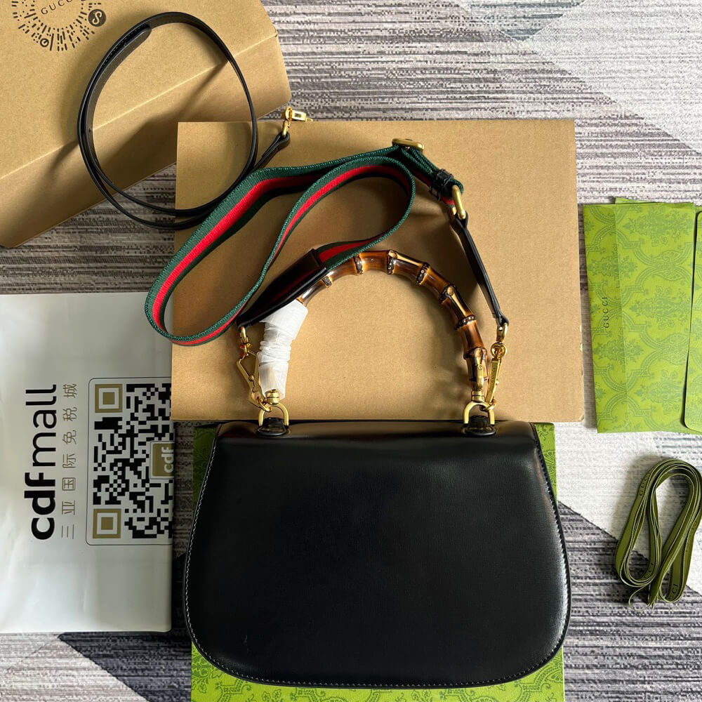 G*u*i bamboo 1947 medium top handle bag